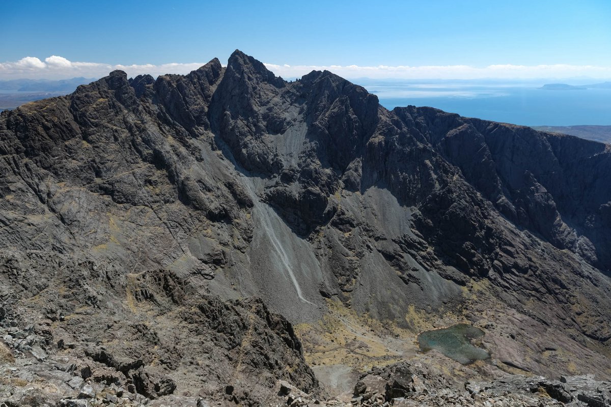 walkhighlands's tweet photo. Sgurr Alasdair is the highest mountain not just in the Skye Cuillin, but anywhere in the UK outwith the mainland. The usual ascent route is via the scree chute shown in the photo. It was named after a Skye man, Sheriff Alexander Nicolson, who wrote... [1/2] https://t.co/uqFUlgj3Yy