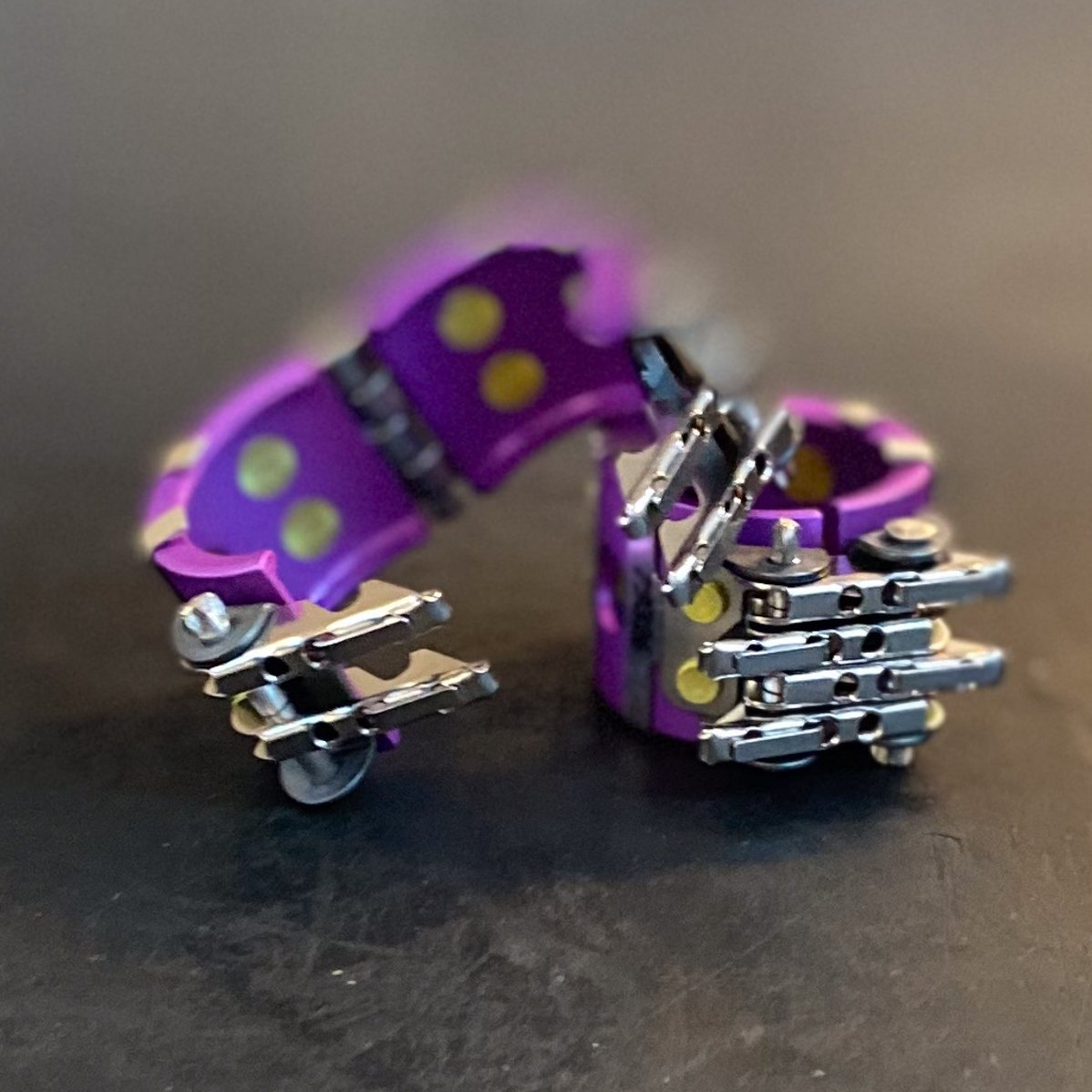 yamaharacingcom's tweet photo. #TechBling These are Wiggins Clamps. Normally used in the aerospace industry, but they are used on the @PataYamahaWSBK R1 to secure the oil lines that run from the oil cooler to the engine. They are quick-release and can be reused. Anodised purple because why not? https://t.co/6NgekiACE6