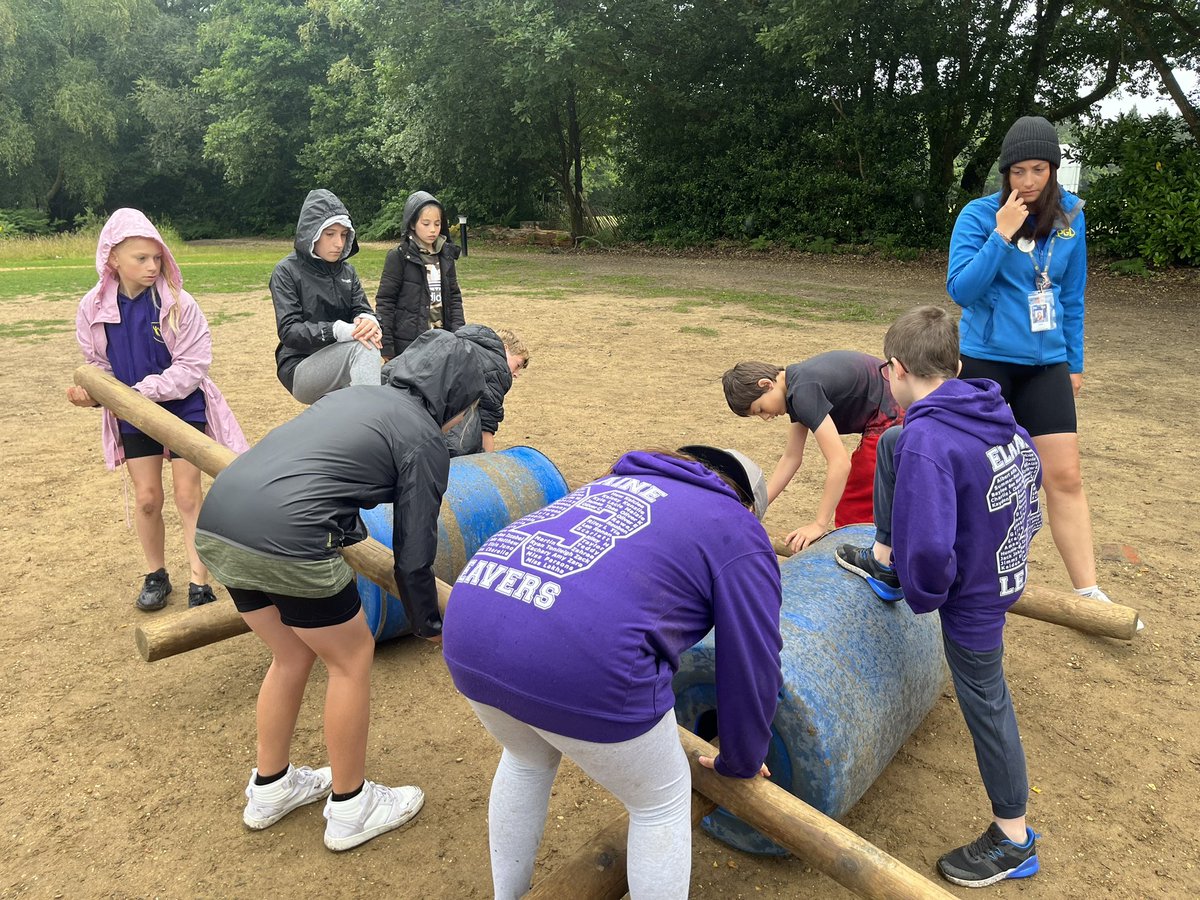 MissEParsons's tweet photo. Our final activity was Buggy Building. We didn’t let the rain dampen our spirits! @TanzaniteEPS @PrimaryElaine @IPAT_Edu https://t.co/EC8ykRTAAK
