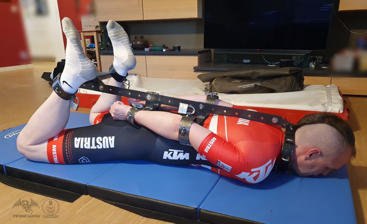 Poor @BDFFAlphadragon had to spend more time hogtied, as metal loving <a href="/BDChainDragon/">ChainDragon</a> decided to put his alphaslave in a a more rigid hogtie while <a href="/yohan555/">yohan555</a> prepared dinner and enjoyed a glass of wine with @rubngum.
But Dragons need to be kept securely restrained at all times.