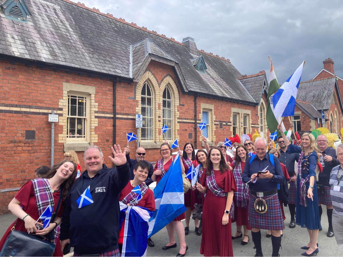 AlbaChoir's tweet photo. Latha 1 aig @llangollen_Eist / Day 1 at the #internationaleisteddfod2023.

Tha sinn air ar dòigh / We are thrilled to be here, representing Scotland and meeting new choral friends. 

Day 1 was singing on the bus and parading - roll on, day 2! 

#albachoir #cleachdi #gàidhlig # https://t.co/wDkwBTtdrn