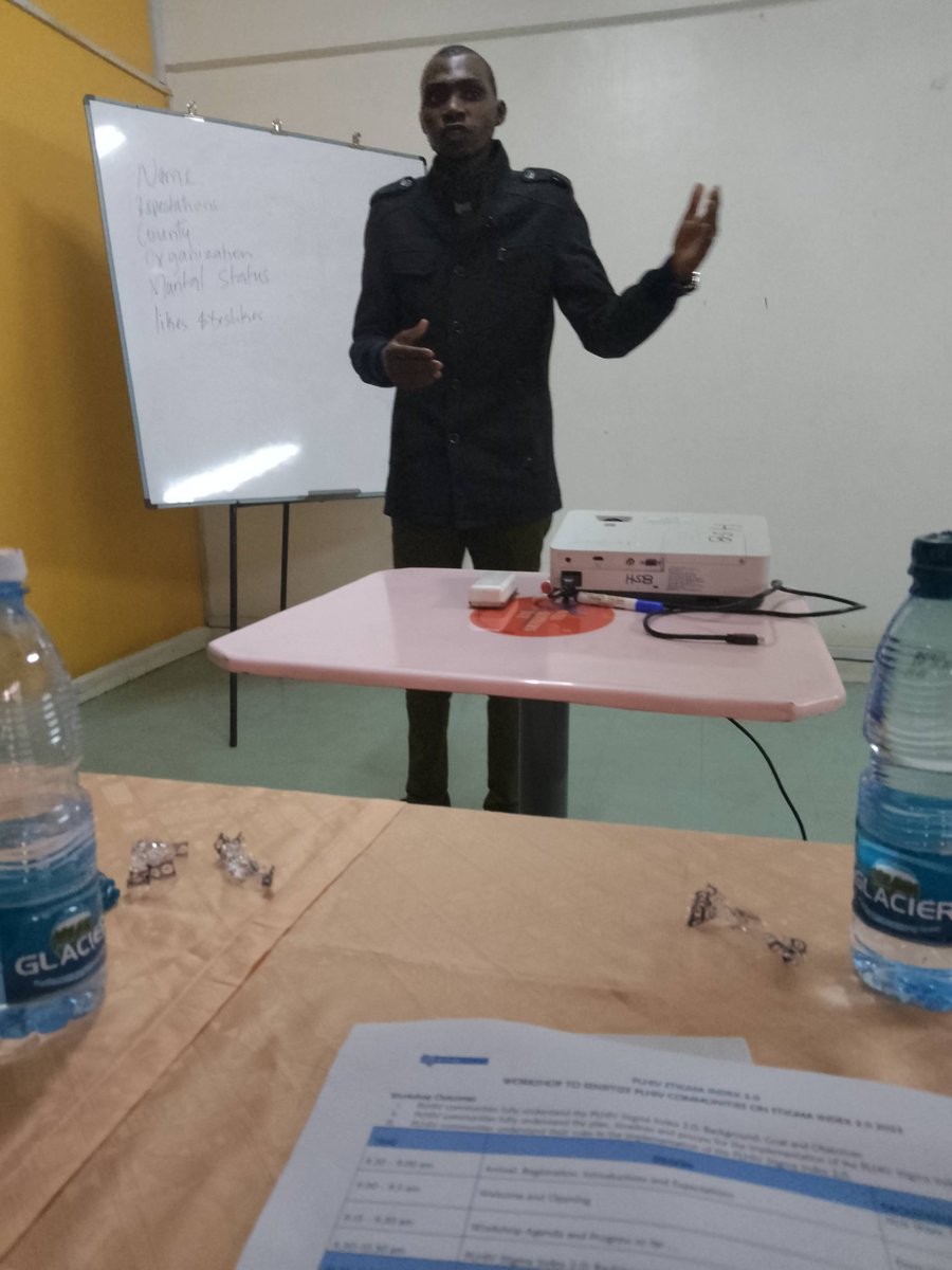 Prof. Steve Anguva giving opening remarks during orientation of PLHIV Communities on stigma index index  2.0 2023 at hotel southern blue.