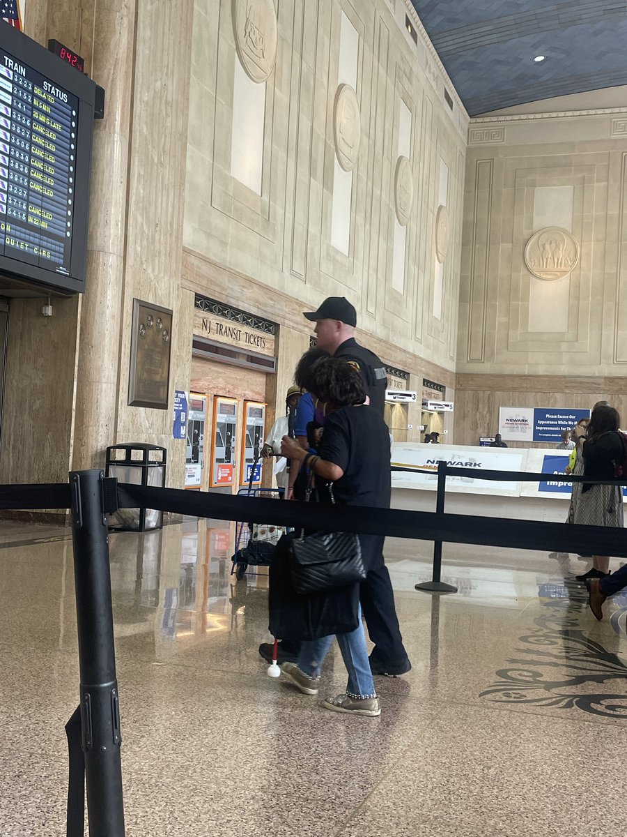 apmadison5's tweet image. Power outage almost all trains cancelled- everyone frazzled and hot….this @NJTransitPolice officer stopped to help an elderly blind woman walk to get something to eat.  Not his job just kindness