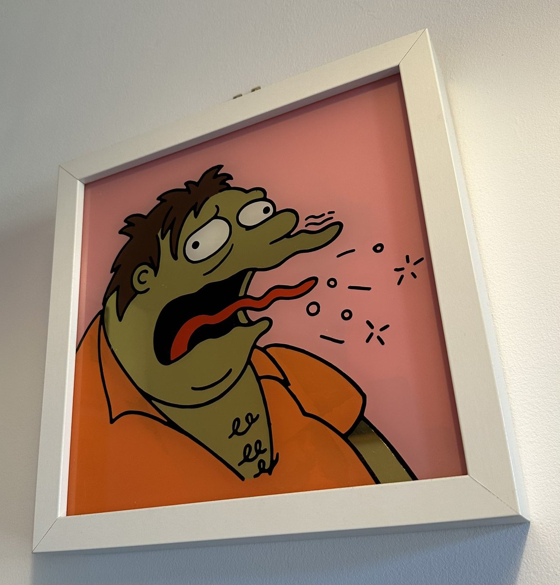 Emelemy's tweet image. That time I hung my lovely gold Barney Gumble sign in the kitchen but quickly had to find a new place for it thanks to its terrifying reflection