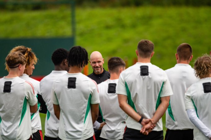 Erik ten Hag addresses his players ahead of training at Carrington.