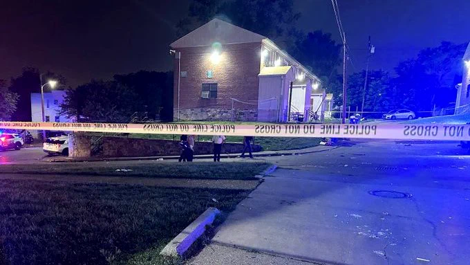 Police cordon off Brooklyn Homes last Sunday morning after a mass shooting left 28 people injured and two dead. (@BaltimorePolice)