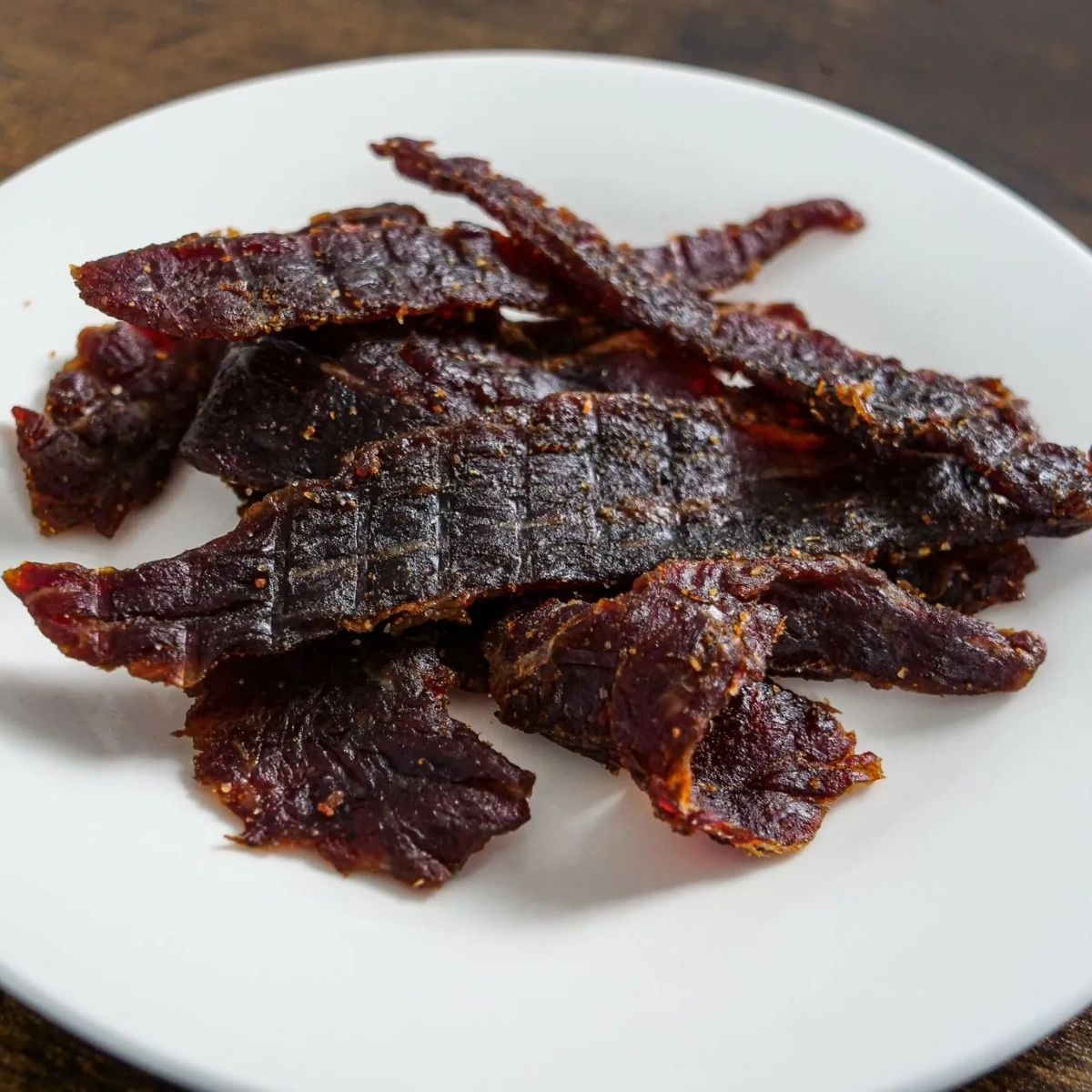 At Tong Jerky, we take pride in our credentials and mission. Our gluten-free jerky is made with top-quality meats and natural ingredients to ensure every bite is packed with flavor. Join us in our mission to redefine snacking one delicious piece of jerky at a time.#BeefJerky