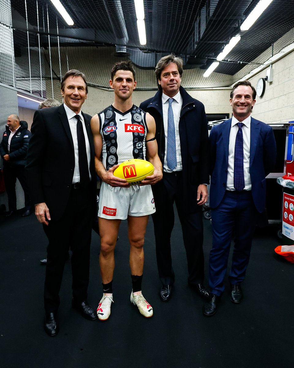 A special moment for <a href="/SP_10/">Scott Pendlebury</a> as he is presented with the game ball from his record breaking match 🤝