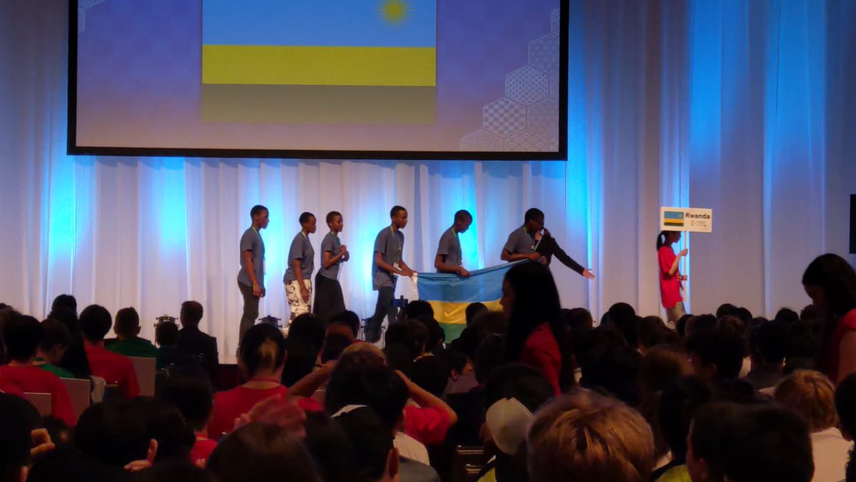 ngogarwanda1's tweet photo. Good  news from Japan! Team Rwanda is all set for the International Mathematical Olympiad  starting tomorrow! They're proudly representing Rwanda in the opening ceremony today. Our mascot Ngoga is with the team, cheering them on as they embark on this incredible journey. #IMO2023 https://t.co/yKBZkwemHM