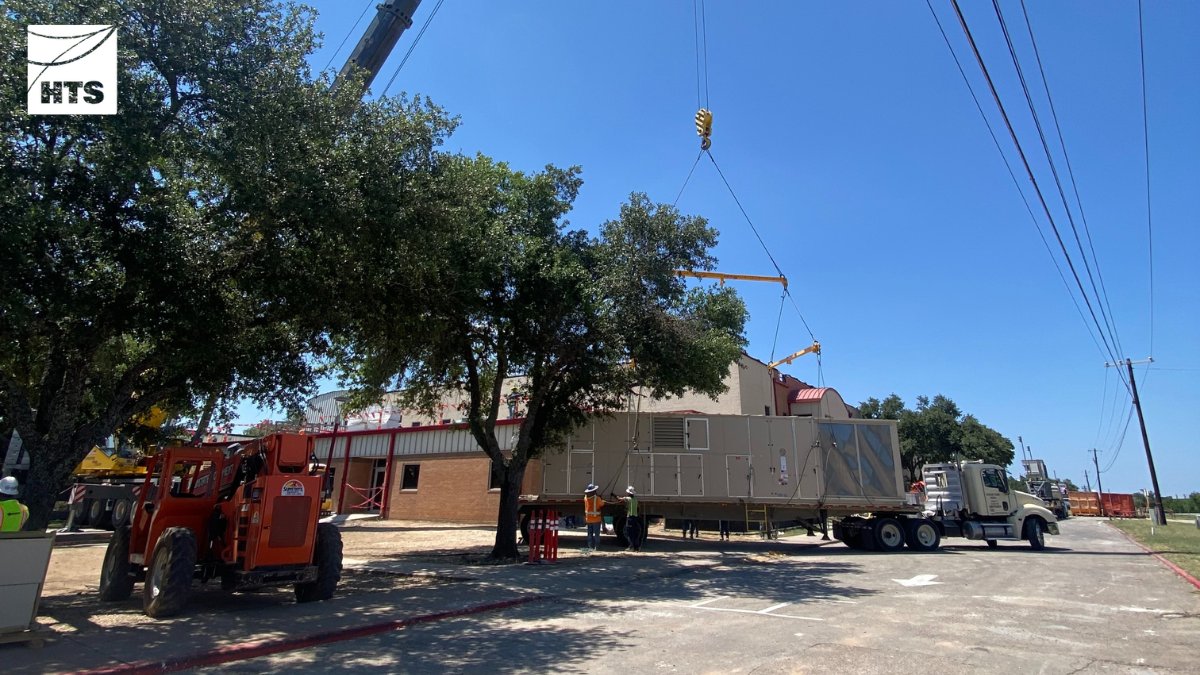 HTS_Engineering's tweet photo. TEXAS: The Hays High School science lab needed two custom energy recovery packaged #RTUs. Each 100+ ton unit had to be lifted over the roof of the building, so Austin's tallest crane was used. Despite high winds & heat, the units were successfully placed. https://t.co/CD4bE6zEp0 https://t.co/KpUoszI7TH