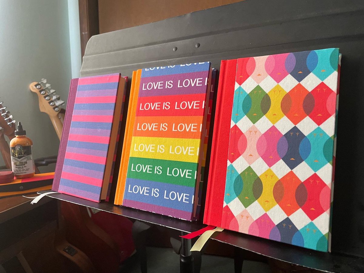 DesignBind's tweet photo. We’ll be exhibiting our line of Pride themed journals and notebooks @heartlandpride  on July 15th. I’ll have my trusty foil stamper on site to provide free personalized initials on any purchase!!  At Omaha CHI center 12-5 https://t.co/m7YBO8Hwgn