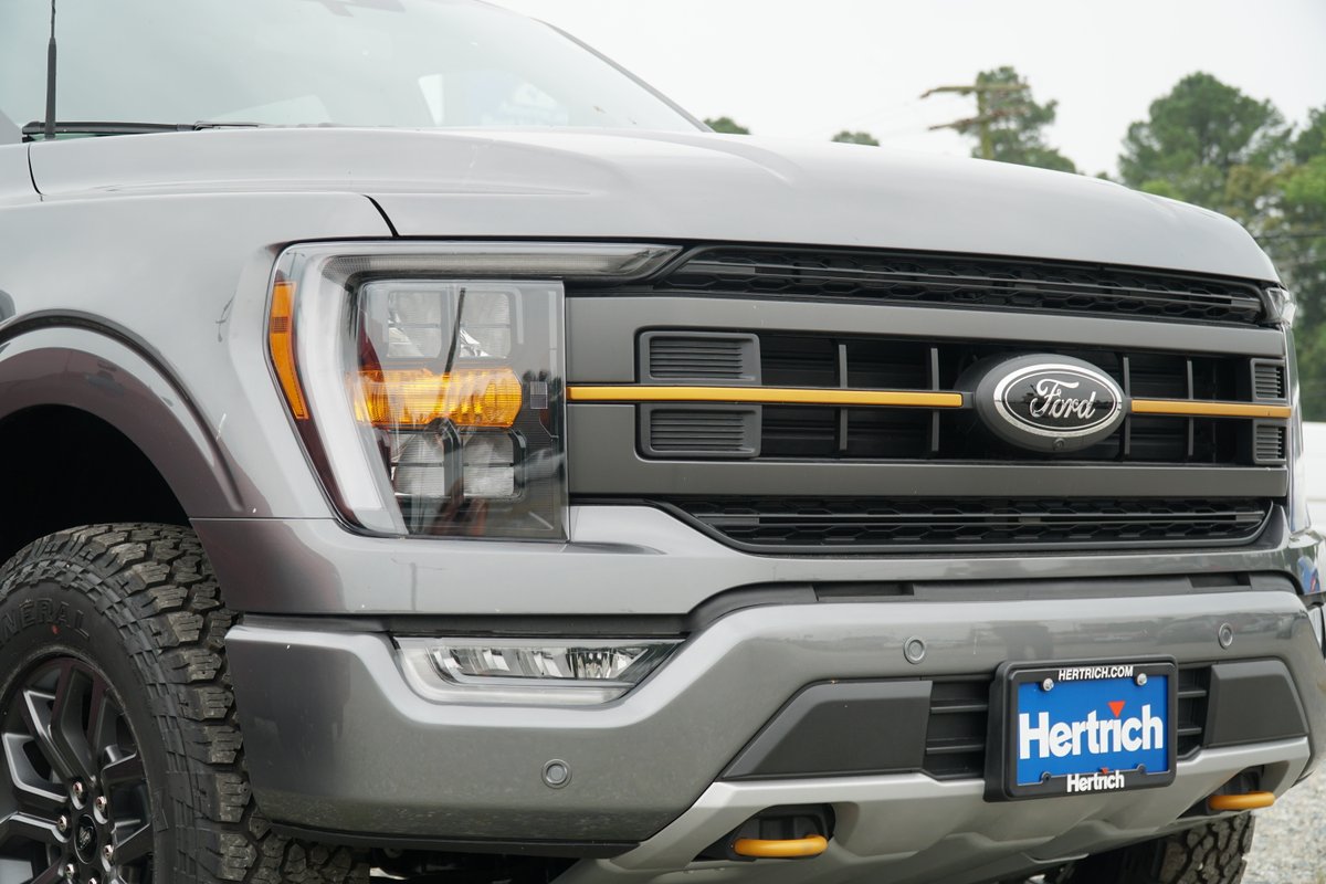 HertrichFam's tweet photo. On #FunCarFriday, we're zooming in on the 2023 Ford F-150 Tremor. The perfect combination of strength and style, the Tremor is characterized by sleek features that spark inspiration. Schedule a test drive today at any one of our Hertrich Ford stores.

#HertrichFamily #GetMore https://t.co/nDCpGdT8Kg