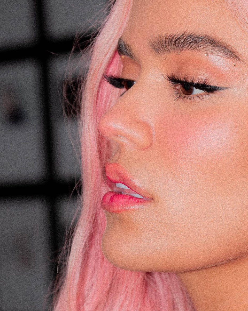 Karol G and her perfect face.