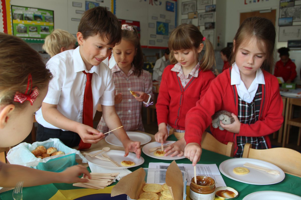 1C's child-led topic this term has been 'Countries Around the World' &, to round this off, the children brought in traditional food from Singapore, Rio, Sydney & Athens. They described their dish before the class (& willing staff who happened to be 'passing!) sampled the food.