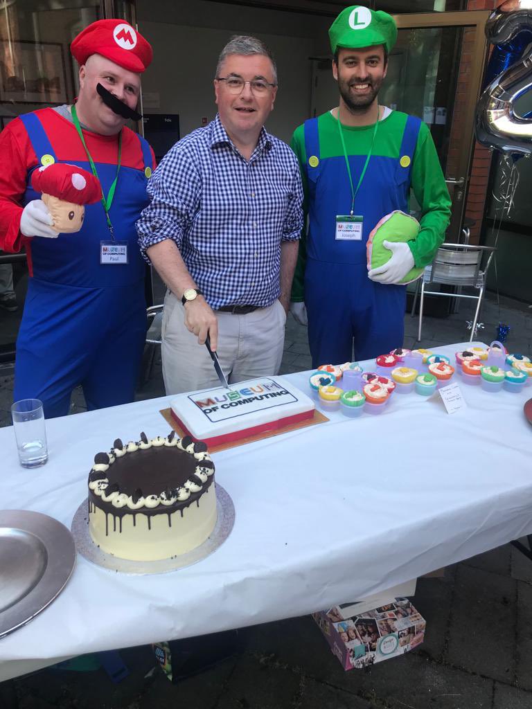 RobertBuckland's tweet image. Delighted to cut the cake at the @MuseumComputing 20th Anniversary event @SwindonLibrary tonight - with some special guests #historyofcomputing The very first Museum of Computing is here in #Swindon