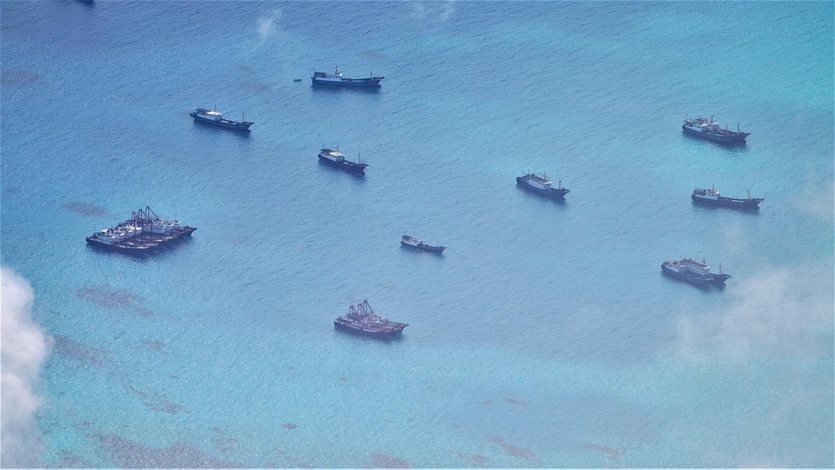 sentdefender's tweet photo. The Armed Forces of the Philippines is expressing “Severe Concern” about a Flotilla of roughly 48 Chinese Fishing Vessels being Escorted by Ships of the Chinese Coast Guard and Navy that have recently appeared in their Exclusive-Economic Zone near the Iroquois Reef and the Sabina Shoal of the Southwestern Coast in the South China Sea; this Coastal Area is very close to the Reed Tablemount which is Extremely Rich in Oil and Natural Gas.