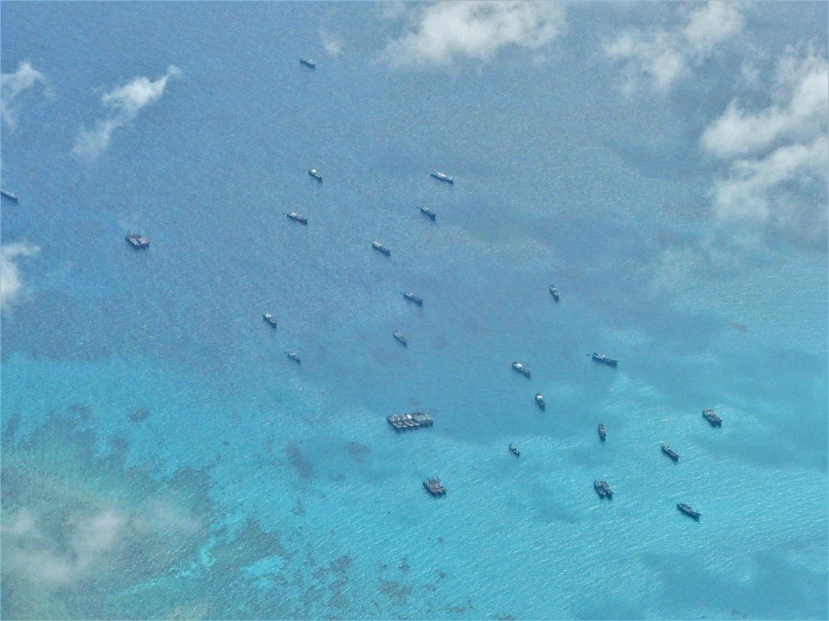 sentdefender's tweet photo. The Armed Forces of the Philippines is expressing “Severe Concern” about a Flotilla of roughly 48 Chinese Fishing Vessels being Escorted by Ships of the Chinese Coast Guard and Navy that have recently appeared in their Exclusive-Economic Zone near the Iroquois Reef and the Sabina Shoal of the Southwestern Coast in the South China Sea; this Coastal Area is very close to the Reed Tablemount which is Extremely Rich in Oil and Natural Gas.