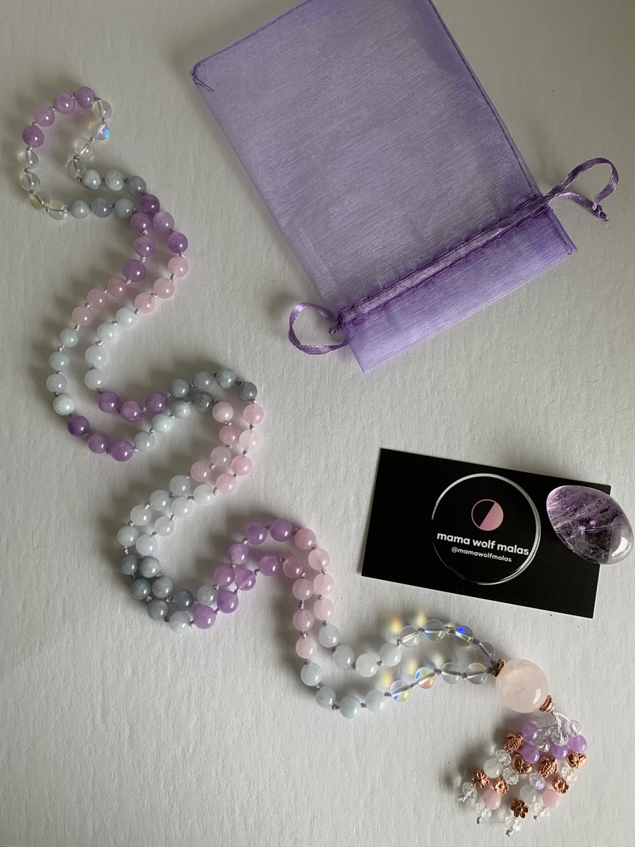 My latest 108 gemstone bead mala, hand knotted by me uses morganite, rose quartz, clear aura quartz  &amp;  rose  gold  accents.  Available in the shop now! 🩵  

etsy.com/shop/mamawolfm…