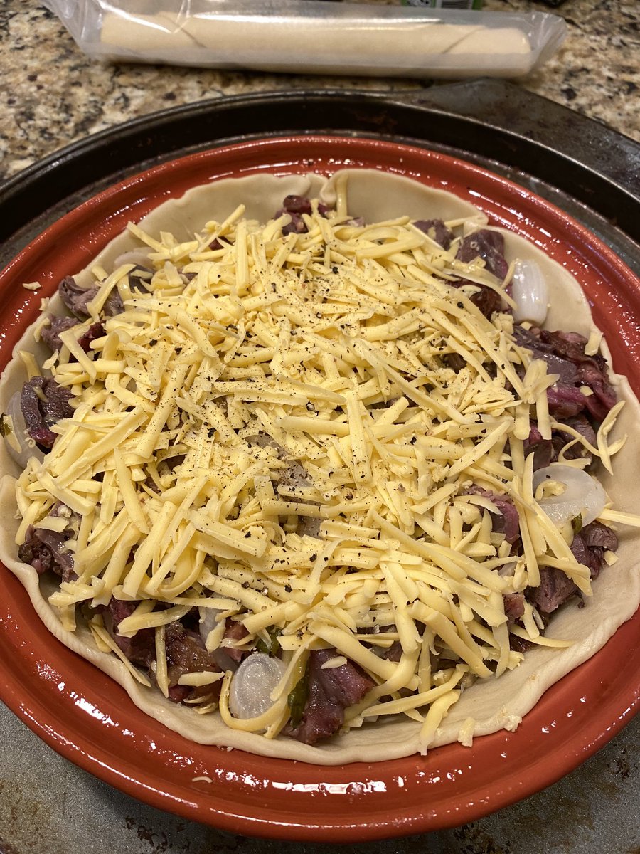 SuzieQuackers2's tweet photo. Literally Shepards Pie! Smoked Lambshank, Onion, Brussels and Jalapeno! Fold in the Smoked Gouda, and wrap in a Pie Crust! Macaroni Salad seals the deal! #FreakinYum #OkieFusionCooking  #OldManTwitter #WishUWereHere https://t.co/jGeyiTAFWx