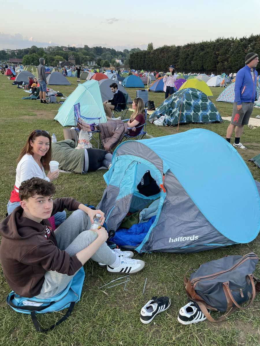 2 of the 4 adult size humans trying to fit in a 2 man tent in Wimbledon queue….