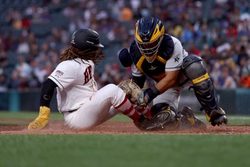 Corey King #20 of Grambling State University is tagged out by Gustavo Nava Sanchez #19 of Southern University during the HBCU Swingman Classic at T-Mobile Park.