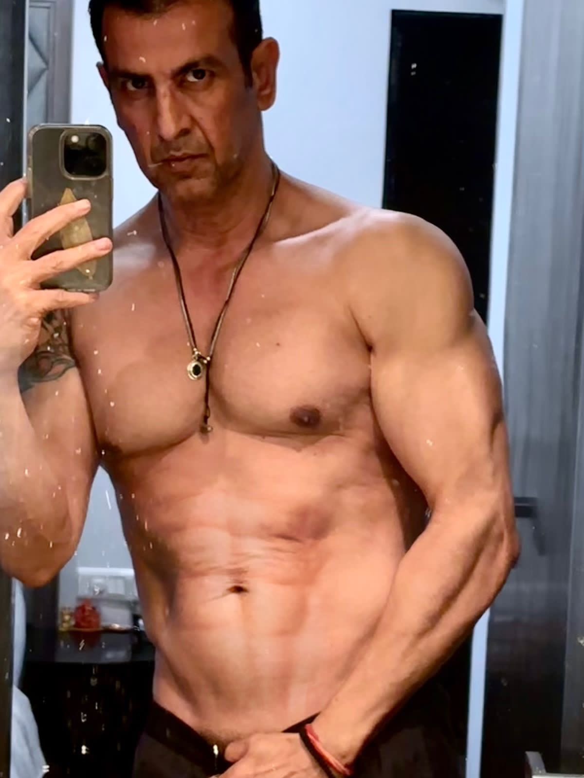 HT City on X: "Ooh la la. Who's 57, rocking a physique to give younger  actors a run for their money? It's @RonitBoseRoy! We talk to him about  those eight pack abs…