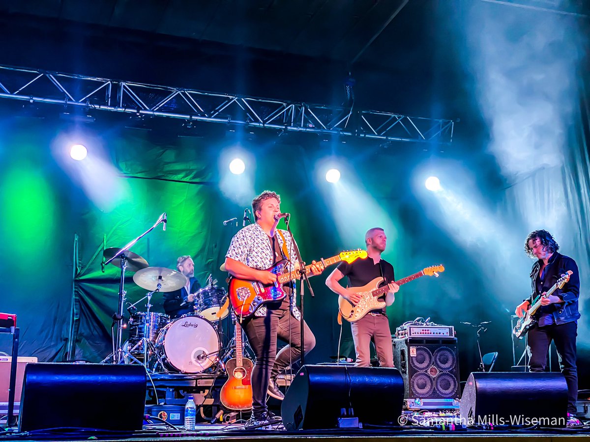 SMillsWiseman's tweet photo. @kellieloder singing some made-up songs (and some real ones too!) at the opening night of the 47th Annual Newfoundland and Labrador Folk Festival @nlfolk in beautiful Bannerman Park, St. John’s! 🩷🤍💚
#NLFolkFest #NLLiveEvents #KellieLoder https://t.co/DOvYQSlMU1