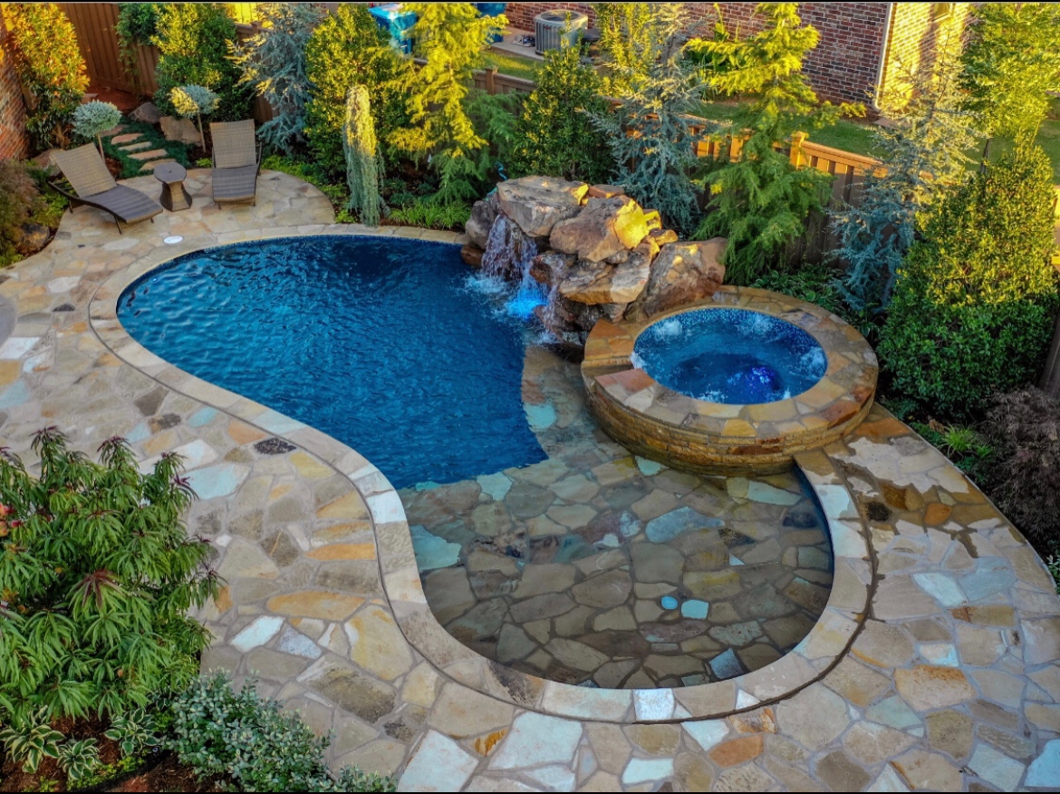Small yard - BIG impact with mature landscaping and a natural pool gives this homeowner a peaceful retreat in their own backyard.  Financing is available at hfsfinancial.net/promo/CAVINESS…