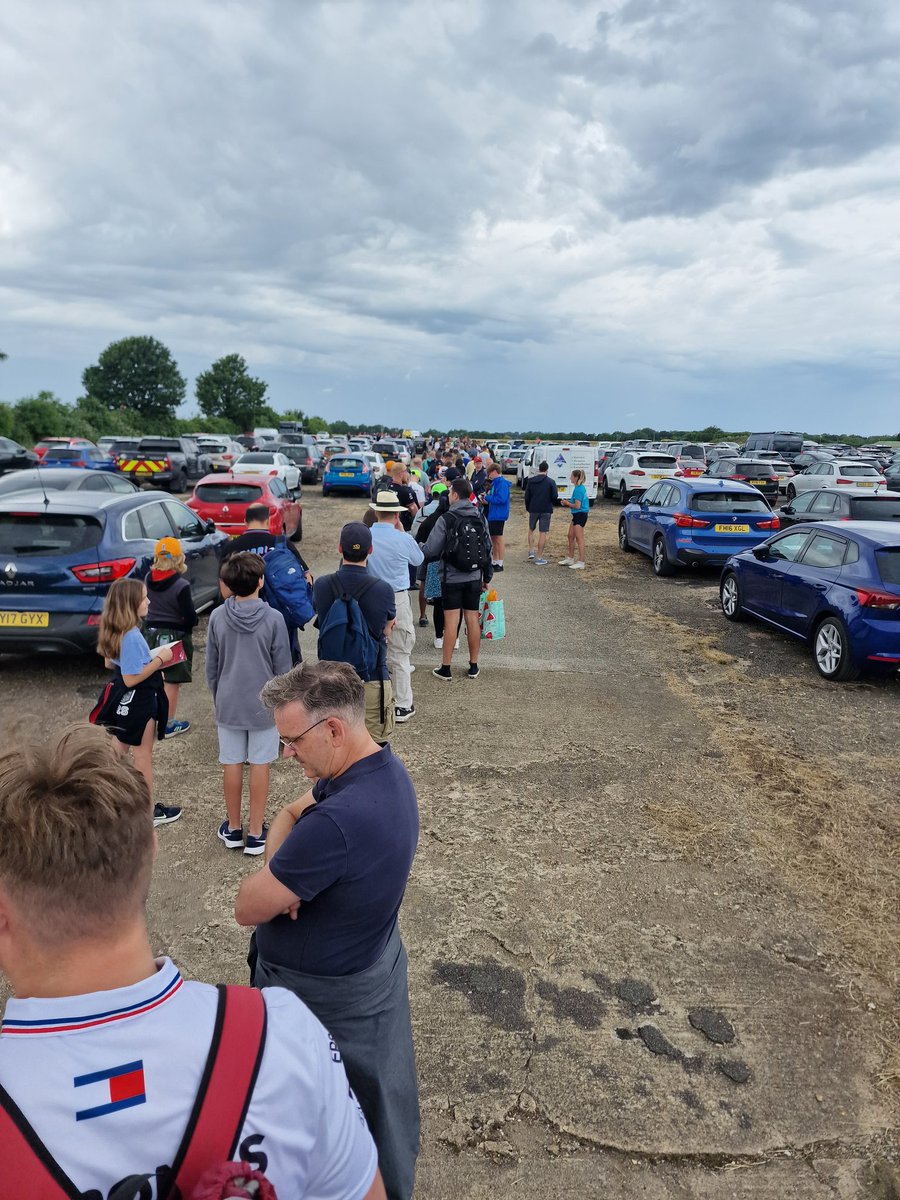Garypru's tweet photo. Oversubscribed Park and ride, stuck in the rain, no buses. An hour wait for next buses...joke @SilverstoneUK #BritishGP https://t.co/nkoAezA2eJ