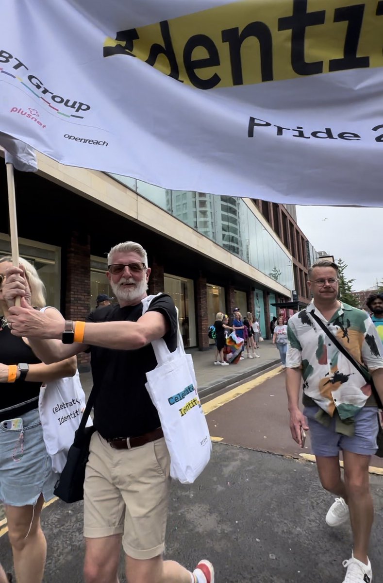 Why yes, I am holding a banner at #bristolpride