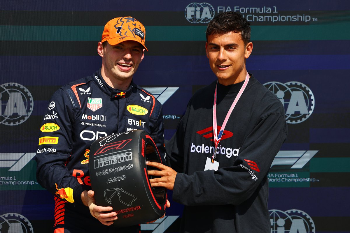 CBSSportsGolazo's tweet photo. Paulo Dybala presented Max Verstappen the pole trophy at the British GP at Silverstone. 🏆 https://t.co/YbkTLKbel2