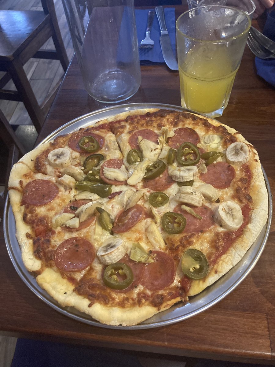 tumnotofficial's tweet photo. This is the pizza I am about to eat. It has pepperoni, banana, jalapeños, and artichokes on it.  In the name of science I ask for your reactions, comments, and opinions.   Please be as honest and authentic as you can. The experiment depends on it. https://t.co/myJDZShjrI