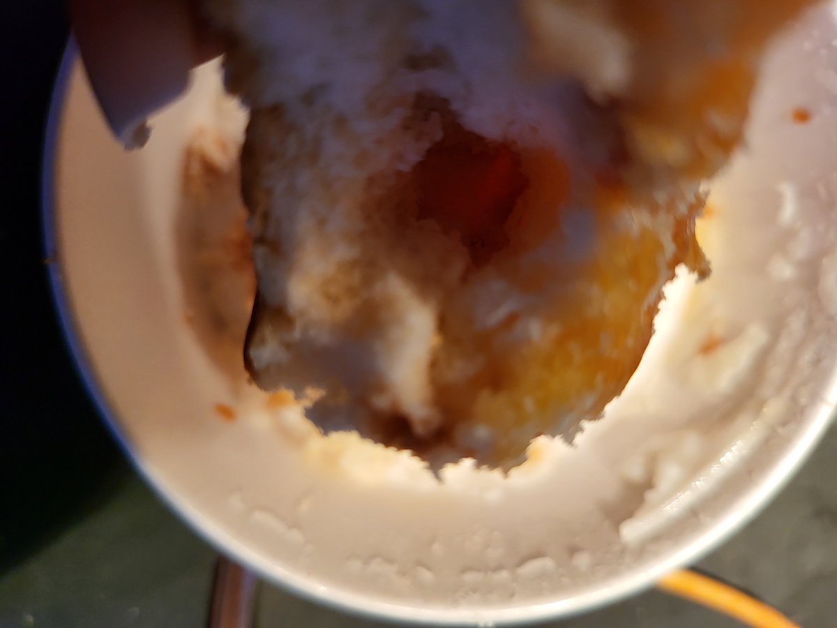What is this that was baked into a strawberry biscuit that I purchased from Popeyes????  I just bit into it. #popeyes #popeyesstrawberrybiscuit #whatisthis #qualitycontrol