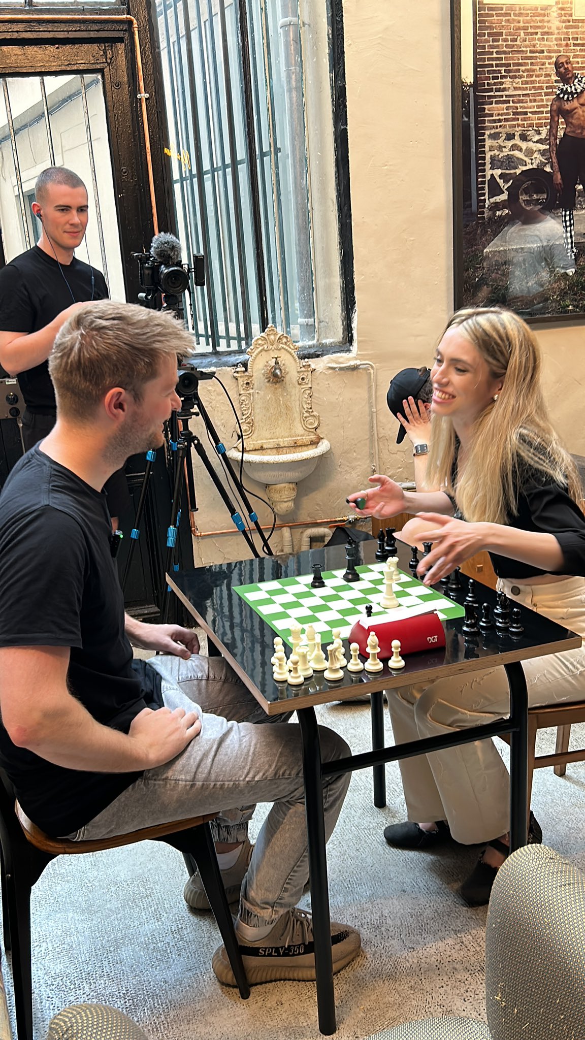 Anna Cramling and MVL playing in a bar in Paris rn : r/chess