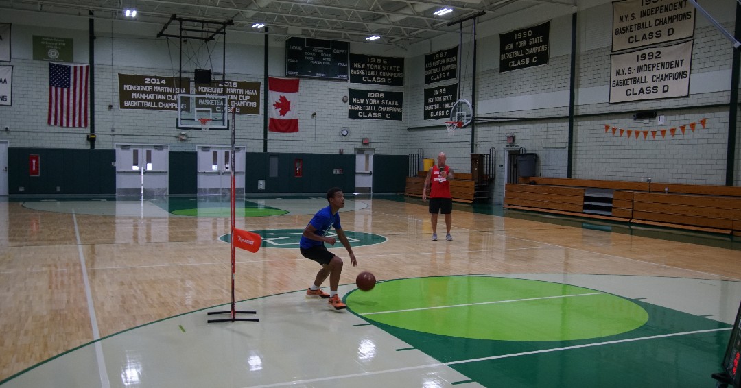 The season's not until winter, but the work's still happening! 

Coach Bradshaw worked with a couple of varsity boys basketball players this week on campus. Check out our new floor!