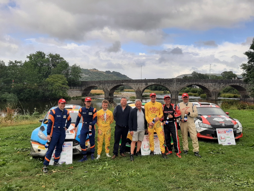 Great scenes at the #NGStages23 finish in @Builthwellstown. A huge thank you to @nickygrist for his outstanding support yet again - to Cllr Gwyn Davies for flagging the cars away & presenting the podium awards - & to @ToyotaNRG for scrutineering. @PowysCC @BUILTHR @PenmaenauFarm