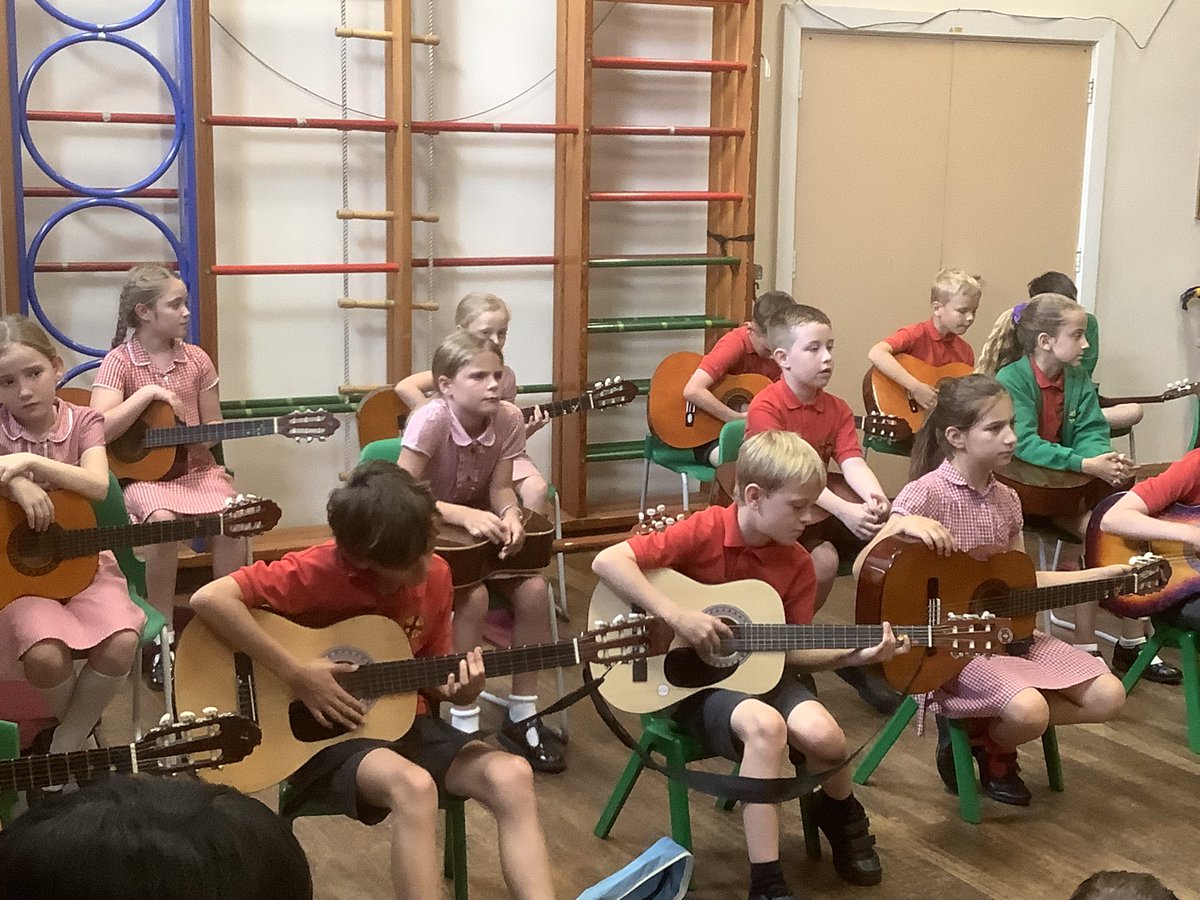 STJBFindon's tweet photo. GUITAR CONCERT - What a treat to hear Rowan Class performing to parents &amp; the whole school. The children were enthusiastic, and have clearly enjoyed learning to play the guitar. Well done to the other children who joined them, and who are having private guitar lessons in school. https://t.co/lujUKfft4c
