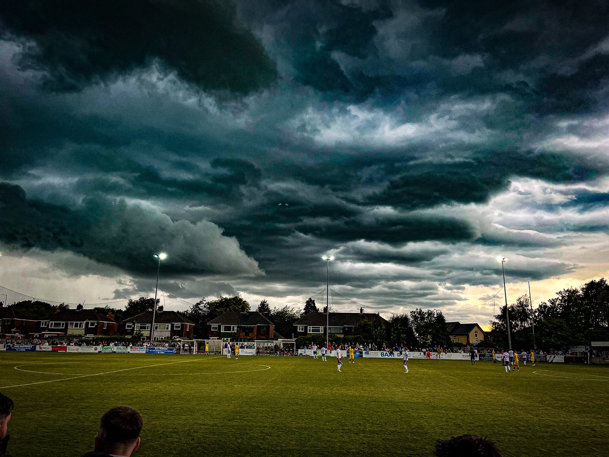 AndyBebbington's tweet photo. Picture taking seconds before that absolute thunder bastard of a storm. 

Footballs back and I’m drenched to the bone. Up the whites. #bwfc https://t.co/UNpxPlbFxF