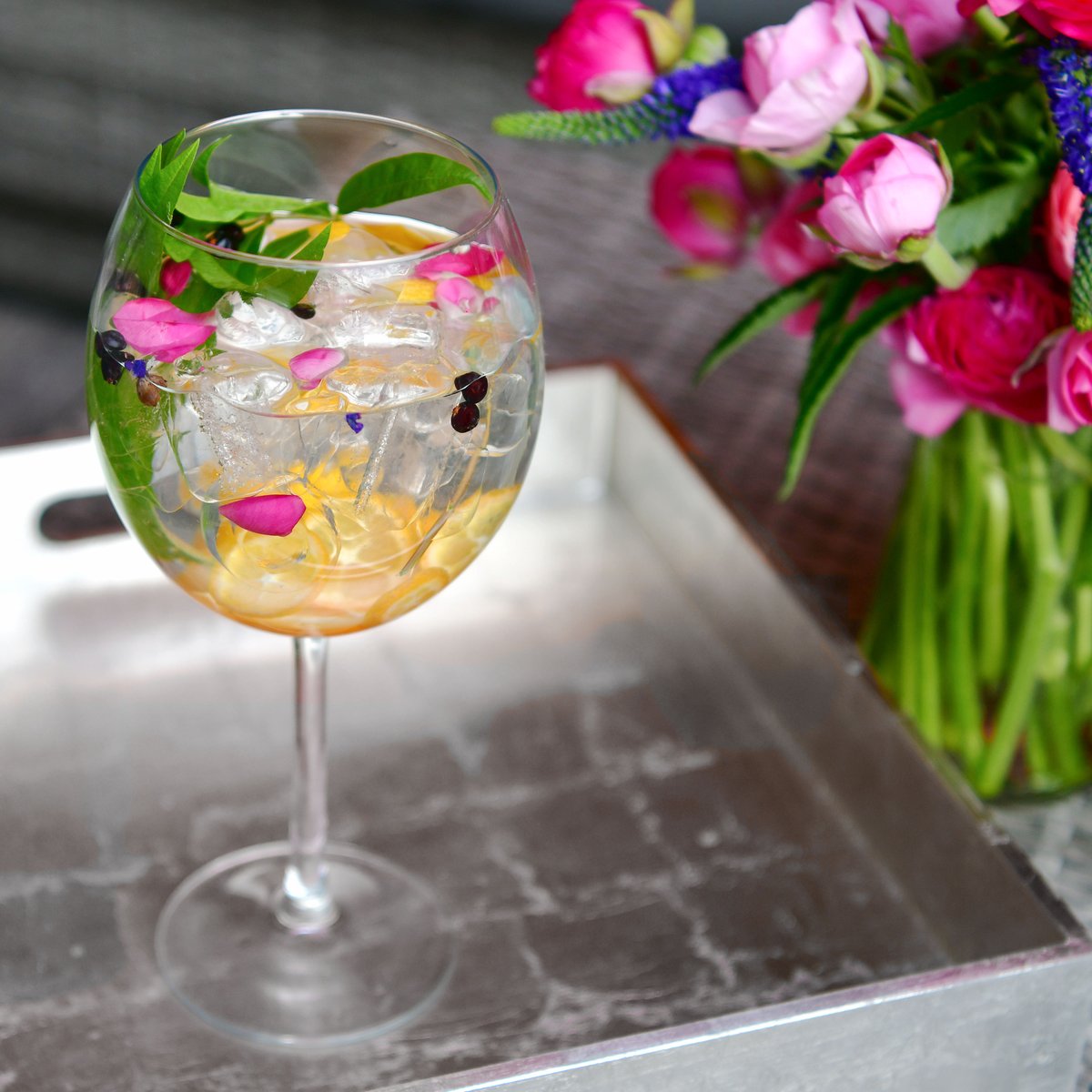 Entertain and imbibe in style this summer with a Gin + Tonic Bar. Simply set up seasonal fruits, herbs & spices with some ice, premium tonic and NOLET'S Silver! #SummerCocktail #NOLETS #Gin #WorldsFinestGins #Gintonic #Gintonic #DIY #StylishEntertaining