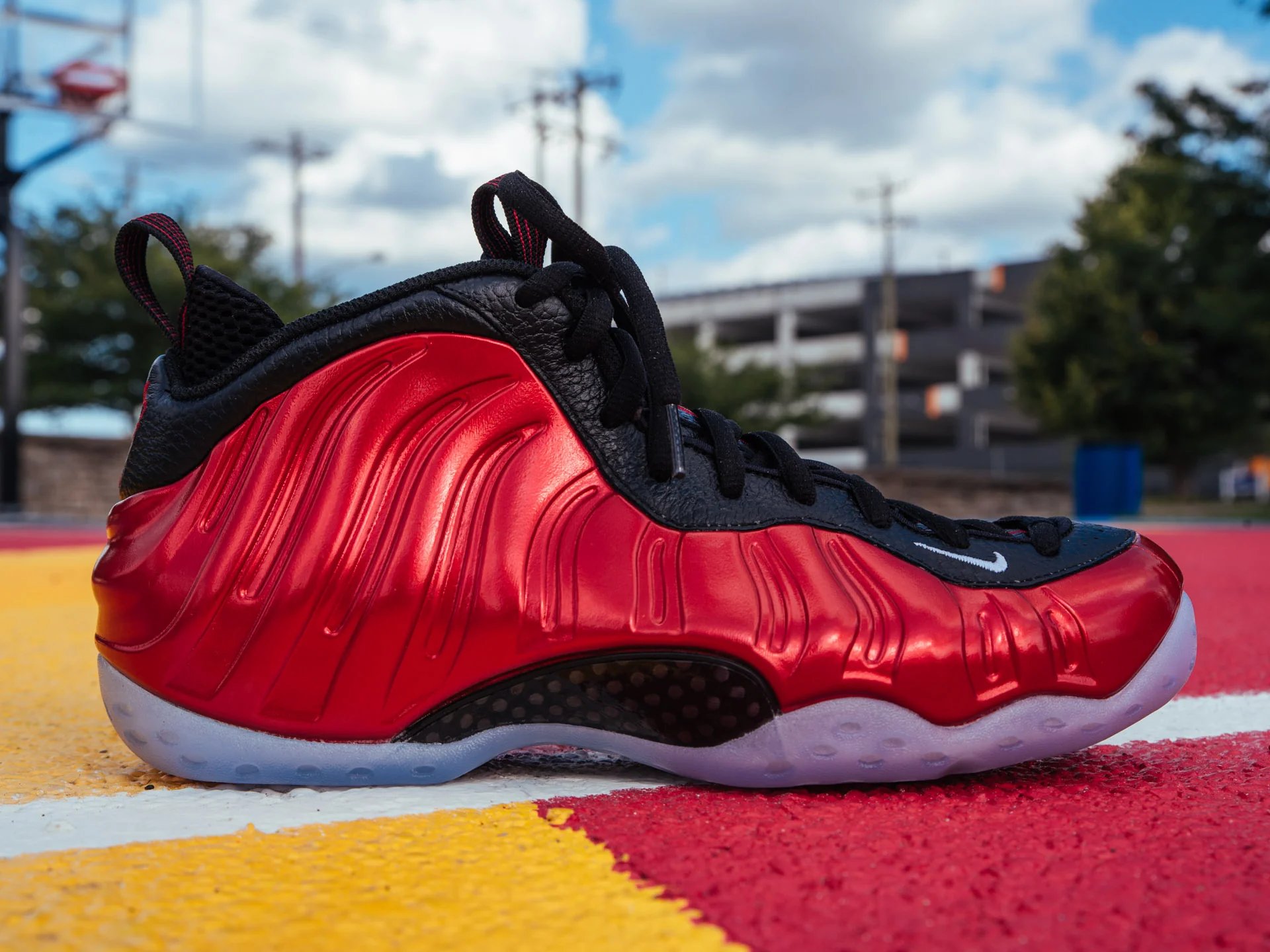 Nike air foamposite one metallic red deals