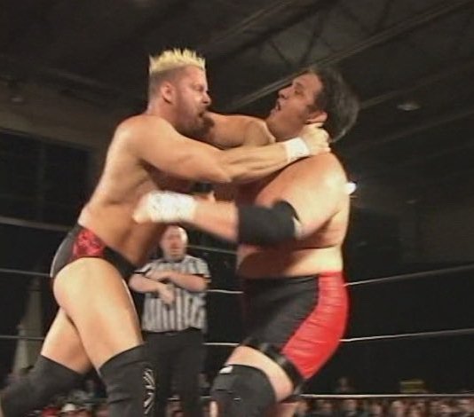 ThrillVictory's tweet photo. Nigel McGuinness and Samoa Joe in the ring when they wrestled for Ring Of Honor. Both wrestlers had long reigns as ROH World Champion and ROH Pure Champion. #NigelMcGuinness #wrestling #SamoaJoe #ROH #RingOfHonor https://t.co/esoyqx2LL1