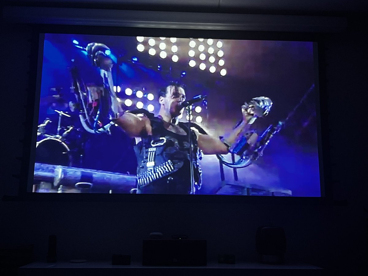 mbosschaart's tweet photo. Ok. Rammstein concert last thursday leaving a hole. Solution: Live in Nimes and Paris on the beamer. Having a standalone house to not annoy neighbours is a plus #maxvolume #rammstein https://t.co/bfvDxDSLsc