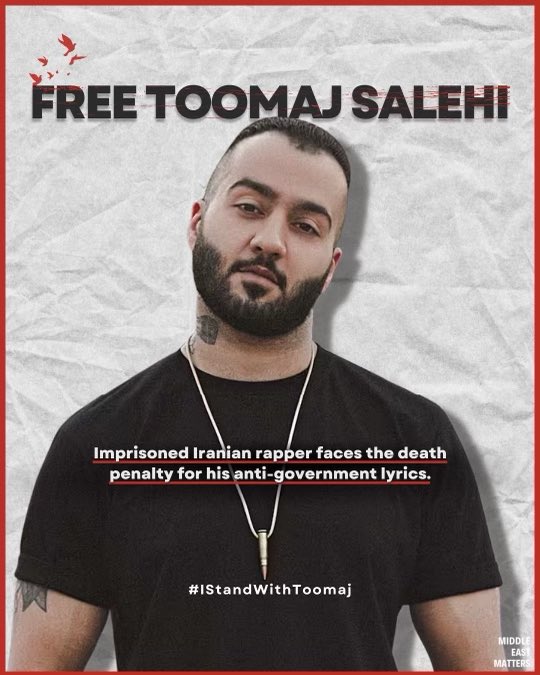 Action4IR's tweet photo. The Islamic Republic has arbitrarily detained dissident Iranian rapper Toomaj Salehi since Nov. 2022 in Iran. 

He is facing the death penalty for his anti-regime lyrics.

@POTUS @khamenei_ir @antonioguterres @UNHumanRights Toomaj must be released immediately.

#FreeToomaj
#IStandWithToomaj 
#ToomajSalehi