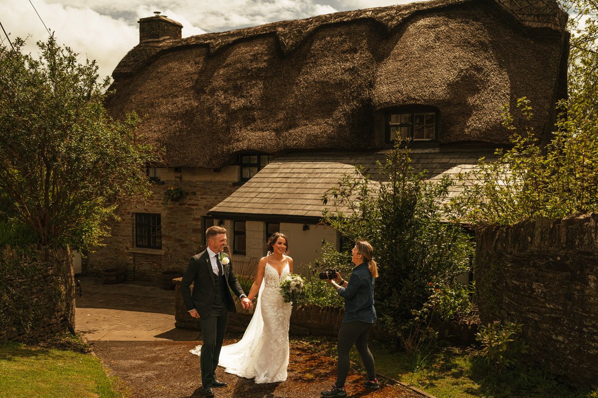 FlashbulbWales's tweet photo. Your friendly neighbourhood videographer, it's Jessica! But also, check out that thatched roof! This pub has been around since 1147. A fine example of old vs new for Katie &amp; Matthew's wedding at the @theoldhouse1147 
.
.
.
#southwalesweddingvideographer #thatchedroof #oldestpub # https://t.co/SQurSbTnfm