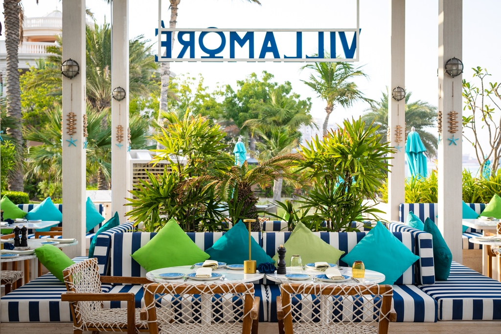 High summer delights and a sun-kissed visit to #villamoredubai.☀️Frosty cocktails on the beach for the golden hours will make you happy!

Call: 04 444 2000 for reservations.

#kempinskipalm #palmjumeirah #beachclub #goldenhour #happyhour