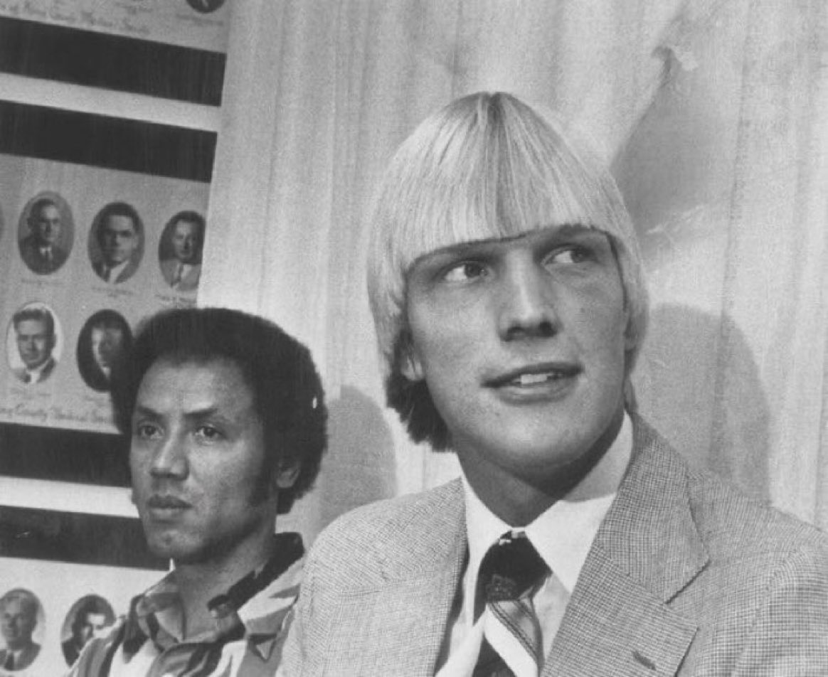 Super70sSports's tweet photo. You can tell Lenny Wilkens is thinking “I can’t believe we drafted this second grade haircut having motherfucker.” https://t.co/rSqE6nvgKq