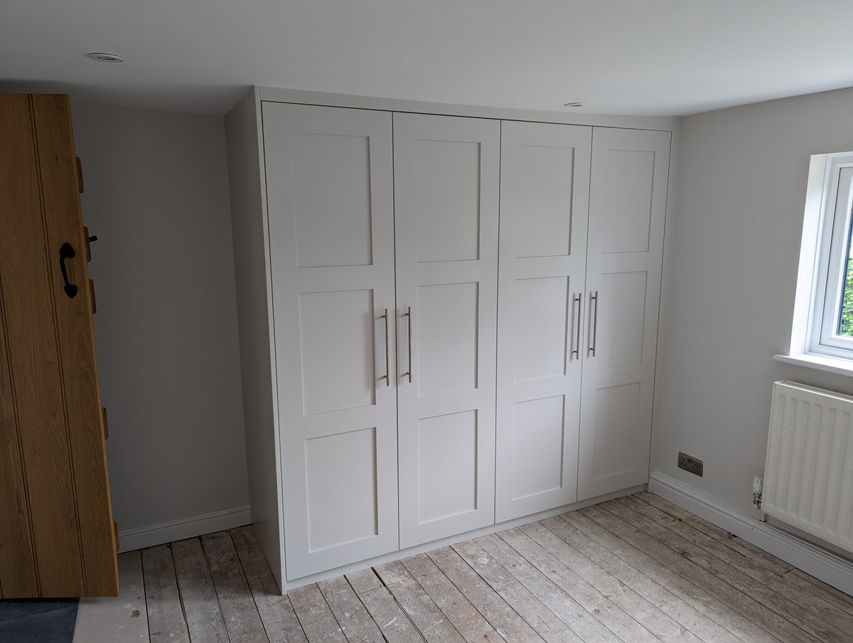 Carpentry1Corb's tweet image. Discover the superior finish of our custom 4 door shaker wardrobe, crafted with care at Corbett Carpentry's joinery workshop! Our expert team hand-made the shaker doors and applied a spray-painted finish for a truly unique design. #CustomDesign #SuperiorFinish #JoineryWorkshop