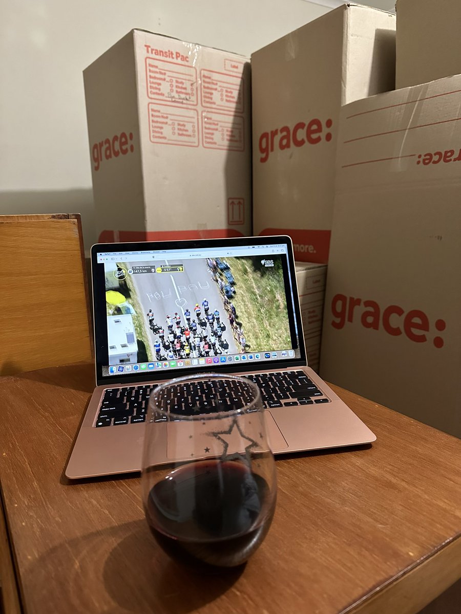 Found the box with the wine in it, a glass and a chair #CouchPeloton #SBSTDF #TdF2023