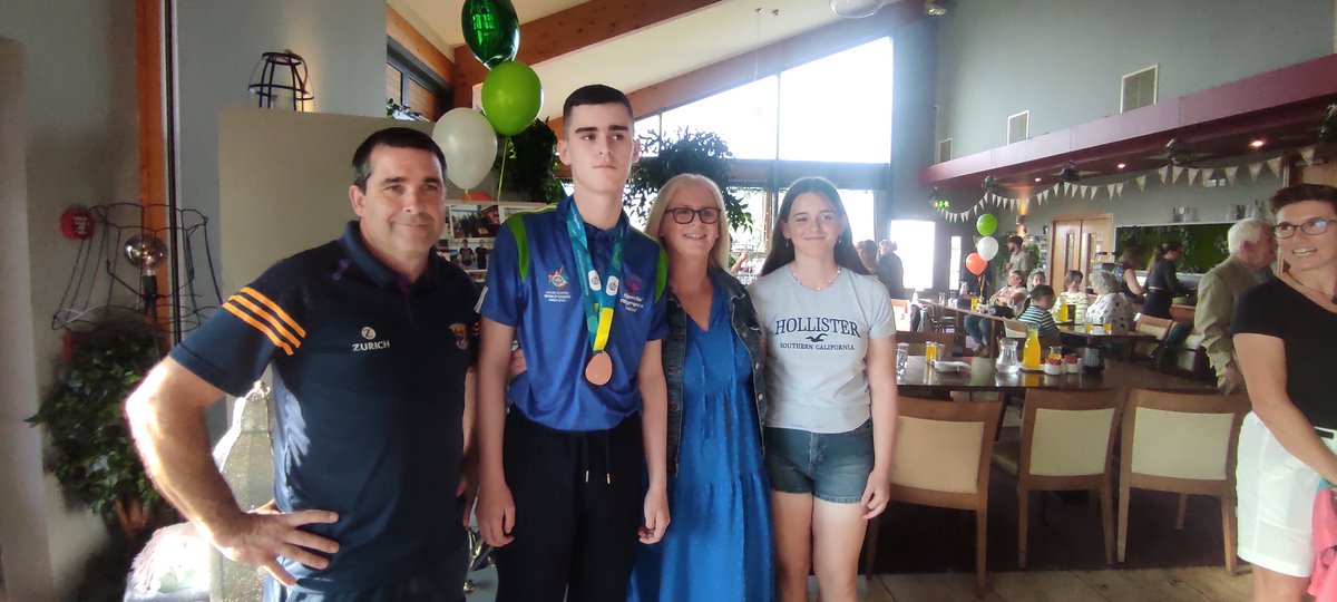 Proud families celebrate with Jenna and Tadhg at our homecoming party .