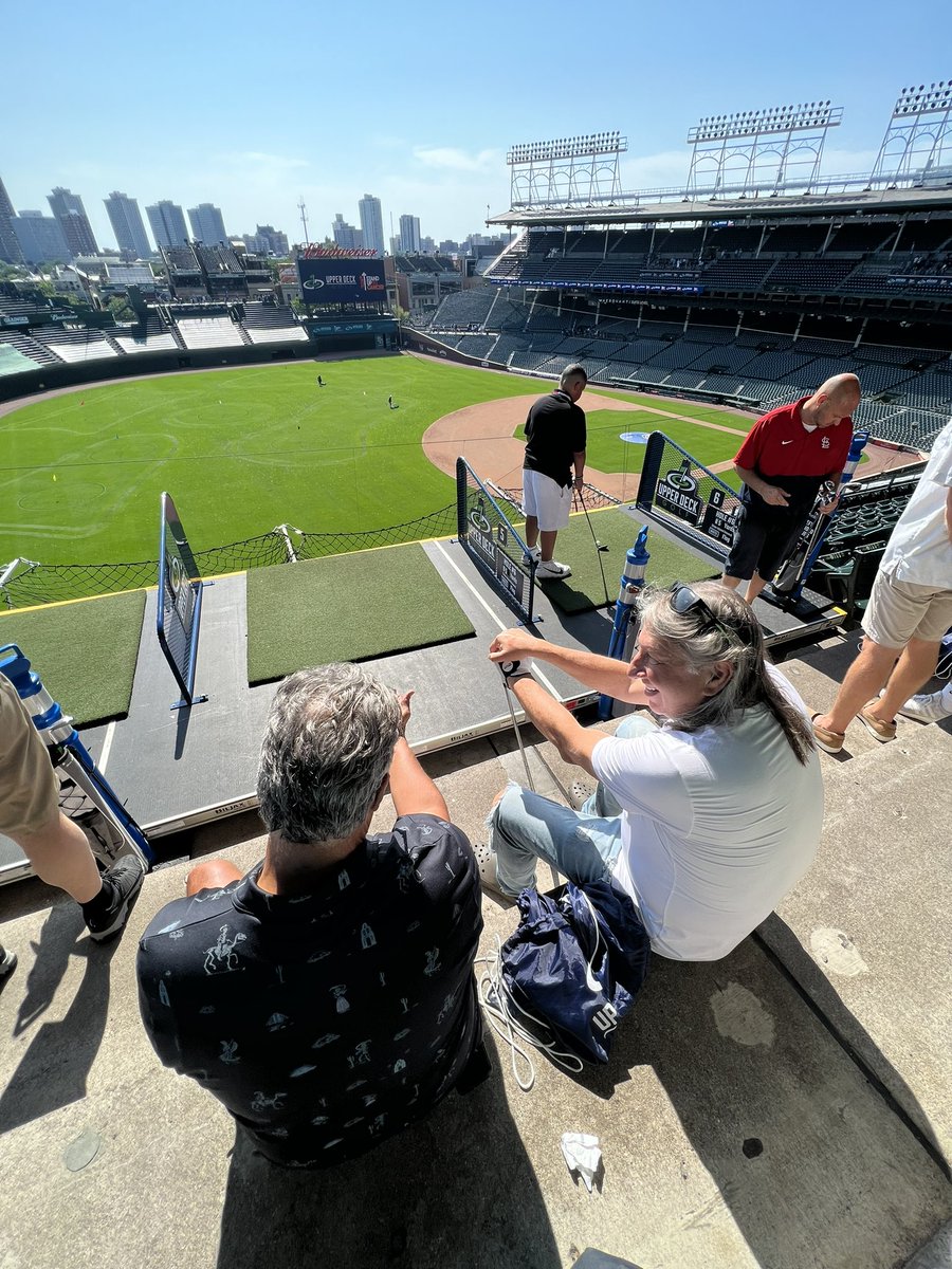 Great day Wrigley launching golf balls off the upper deck. Tom &amp; <a href="/Tony_BATtista/">Tony Battista</a> are like little kids having the times of their lives. Full video on tomorrow’s show. Who do you think won? #golf #notmasters